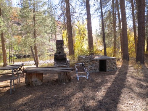 I sat in the rocking chair and ate a snack. There was even a cribbage board carved into the table!