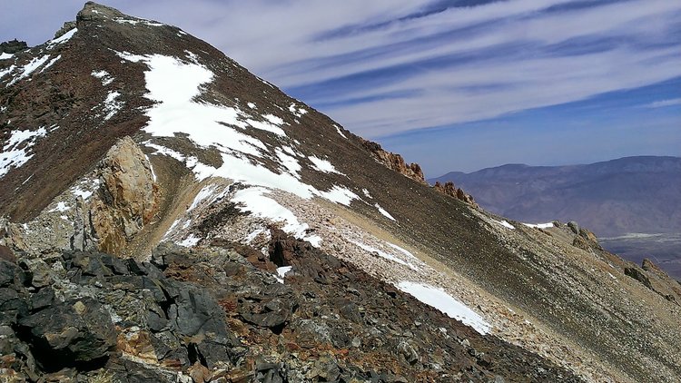 Looking toward the summit of Cardinal Mountain from the West Ridge as it nears the south chute route.