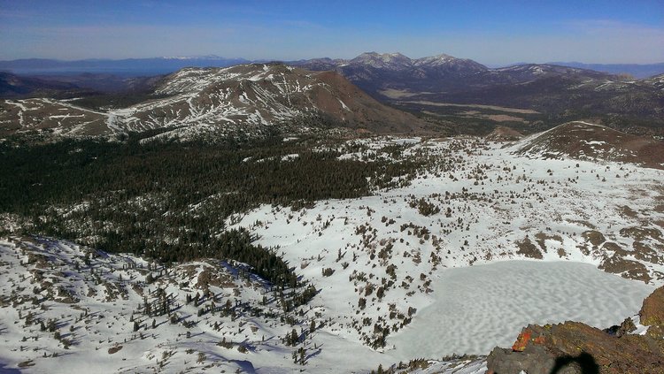 Looking northeast to Red Lake Peak, Hope Valley, and Freel Peak.  Red Lake Peak is a popular ski and snowshoe area most winters, but is mostly barren this time.  Carson Pass lies at the base of Red Lake Peak's south slope (center).