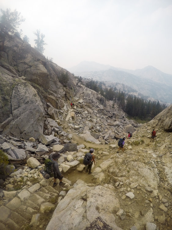 Rocky switchbacks as the smoke starts to roll in