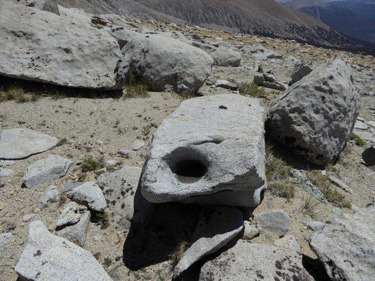 one of a few grinding rocks off trail by mt kaweah