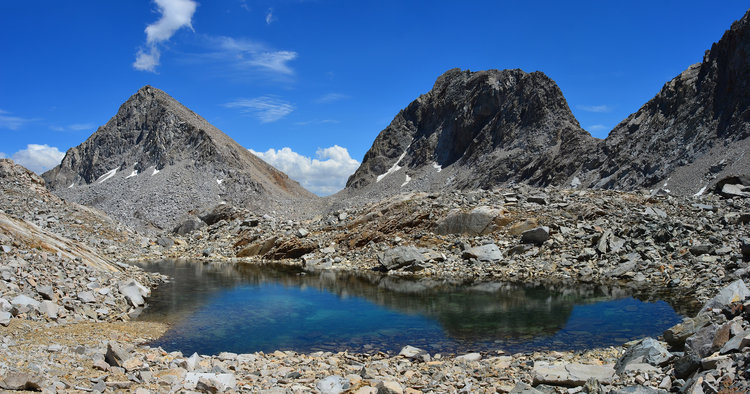 I really really loved this high tarn below Ladder Pass &amp; Black Divide Crossing. Something about these high lakes with no vegetation really calls to me. It is just so stunning to gave out and see rock guarding you on all sides. Ladder Pass is in the center.