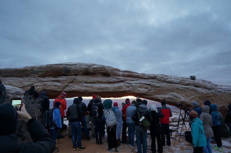 Like this photo of famous Mesa Arch at sunrise.   We happened to be passing there at the right time, so the crowd really didn't bother me, but was sort of amusing how every bit of space in front of the arch was filled with tripods...
