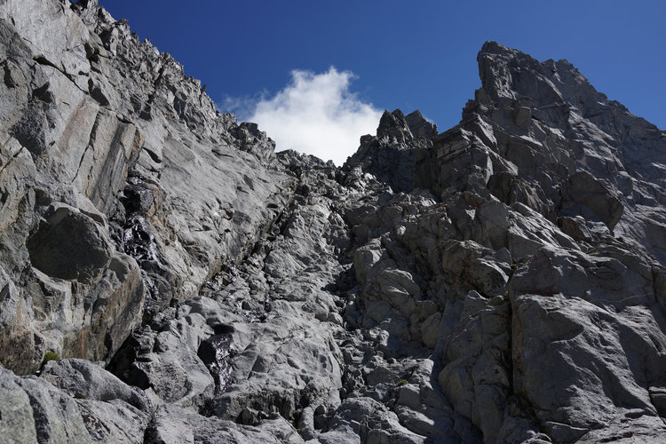 Sustained Class 3 climbing with varying levels of difficulty in the central chute up to Norman Clyde Peak.<br />@ Rogue Photonic