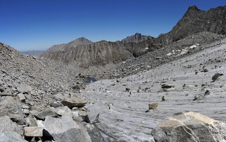Walking on this dirty and rock filled glacier was definitely an experience to remember. It was a nice break from all the rock before and all the horrible rock to come. <br />@ Rogue Photonic