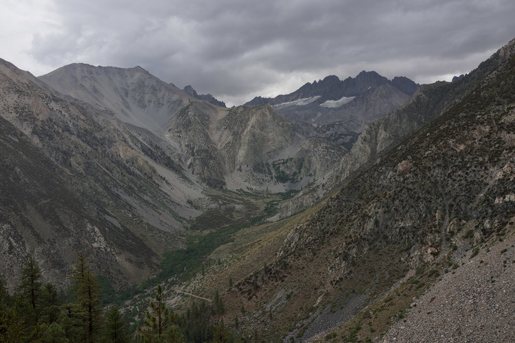 The majestic view up the South Fork of Big Pine Creek with Norman Clyde Peak and Middle Palisade looming in the background from the hillside below Logging Flat. Storms a brewing! <br />@ Rogue Photonic