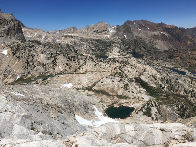Looking down at lowest Conness Lake, and further toward Cascade Lake from traverse of Conness east ridge.
