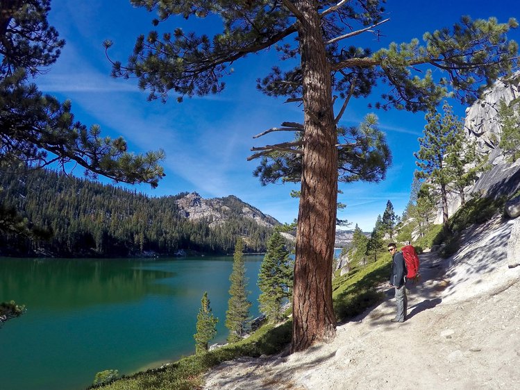 Hiking along the emerald green waters of lower Echo Lake