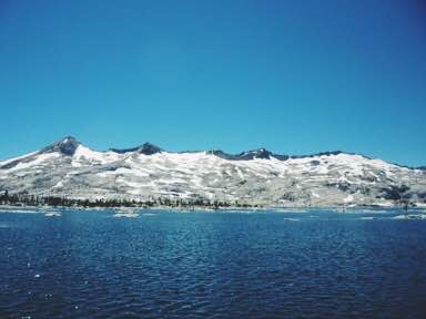 Lake Aloha, about 6 miles into our hike. It was a beautiful place to stop for a snack. Also here I should mention that permits are required for Desolation Wilderness, and we met a ranger here who checked ours.