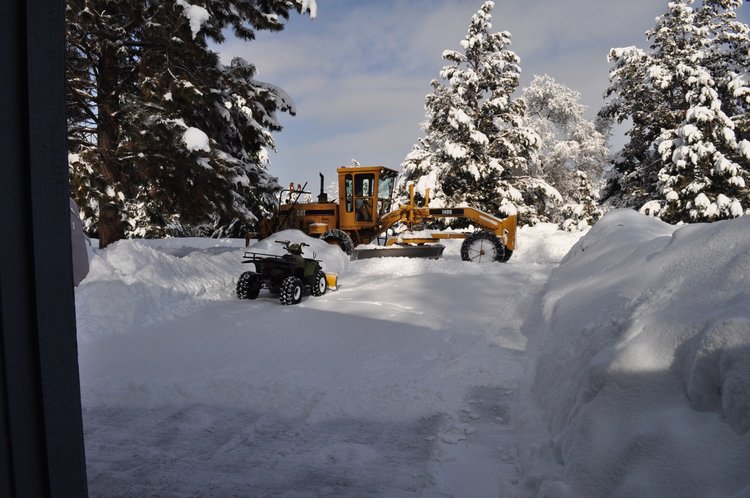 Neighbor's quad and grader (leaving berm that is really heavy to hand shovel)