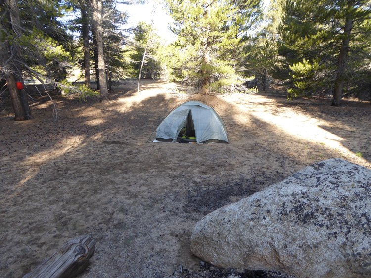 Tent with flattened air mattress inside