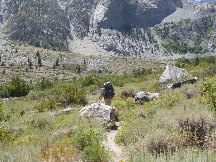 Approaching creek crossing. The trail later climbs and then traverses the scree slope in the right-side background.