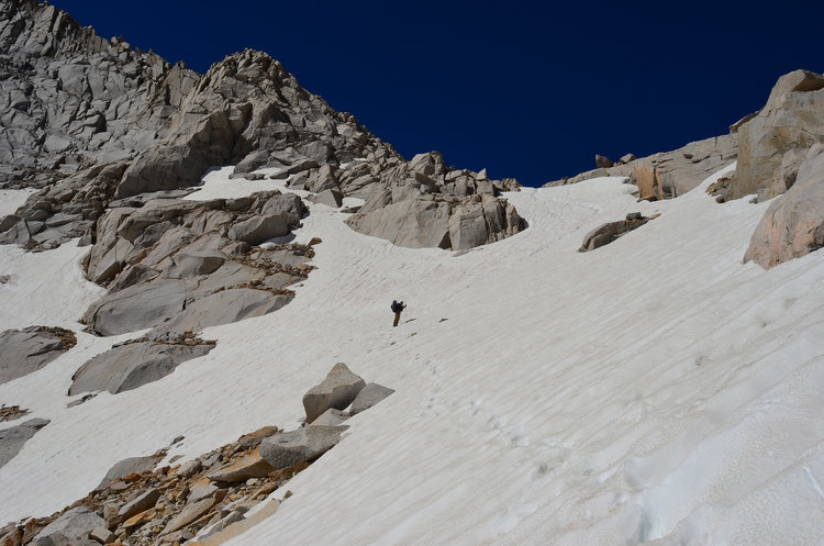 On the snow en route to the top of Royce- Merriam Saddle. Rogue is standing right below the steepest part.