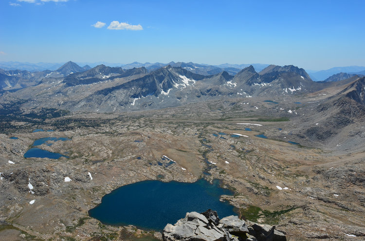 Looking down on our lake in Upper Basin and out into the heart of the Central Sierra!