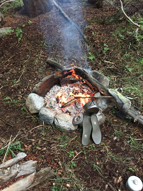 This is us drying out our gear since it was completely drenched. Pretty sure this was after I burned one of my socks to a crisp... that was lovely.