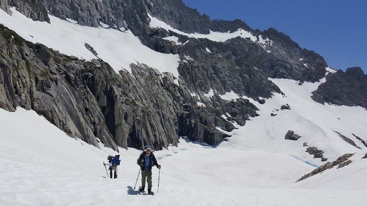 Completely frozen Precipice Lake in the background.