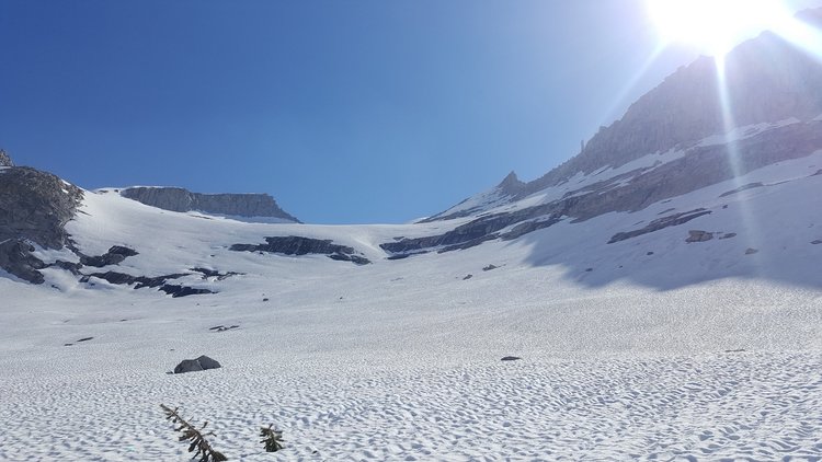 Eagle Scout Peak with route up full of snow.