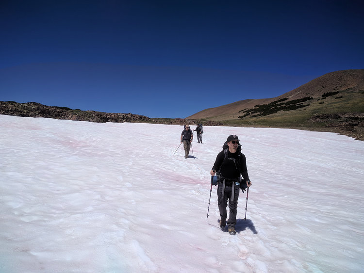 Crossing our first snowfield after Parker Pass