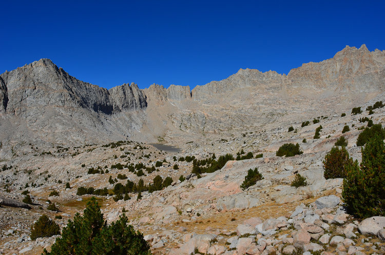 Looking into a remote and desolate cirque below Mt. Jordan and Genevra. We would camp at that lake for the next 2 nights. Mt. Jordan is named after the founding president of Stanford University.
