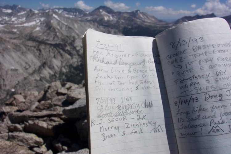 Inside the Arrow Peak summit register...
