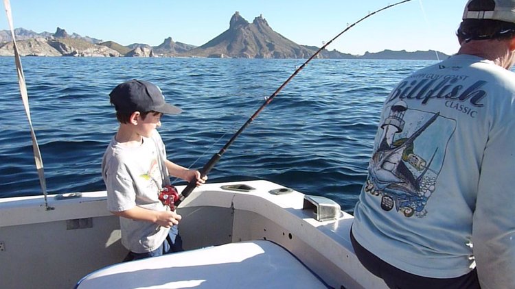 Grandson cranking in a bonita