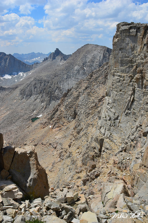 On a narrow system of ledges and a few loose chutes you make your way up to the top of Table Mtn. The view looking across to Milestone Pass, Milestone Mtn. and beyond was magnificent.