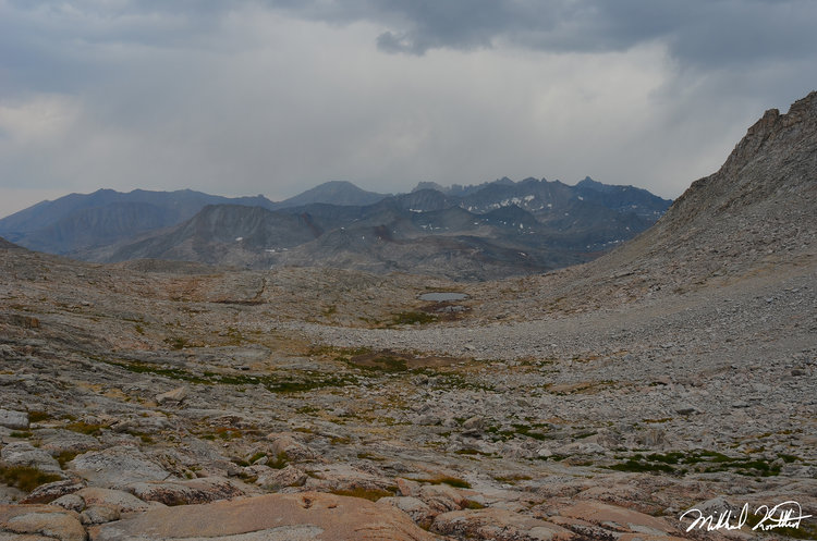 Coming off of Milestone Pass after lunch we could see the heavens were in charge that day. The Kaweah's were getting the full might of a summer thunderstorm and soon we would too. Milestone Bowl is directly below and camping was... sparse.