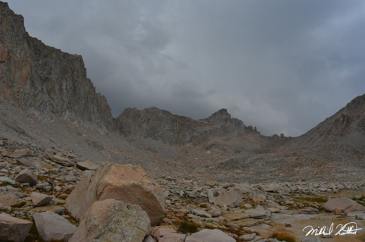 Looking back up to the mighty Milestone Peak and Pass you can see the clouds are ominously building.