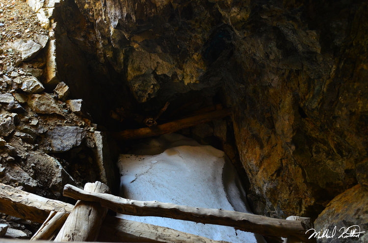 It's not called Copper Mine Peak and Pass for nothing! There's an actual Copper mine up there. These are the wooden remains inside of the openings. Quite incredible!