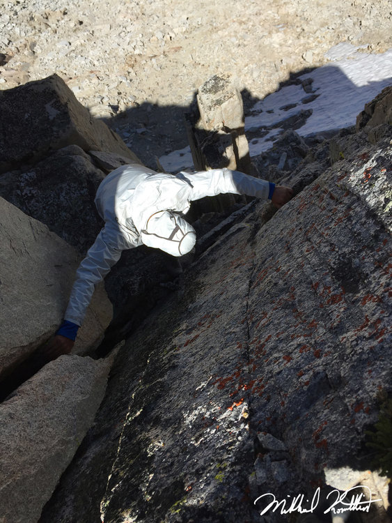 Oh, you know... Rogue doing a Class 5 downclimb. I know it may not look that hard but it was pretty fricken hard and if you can't tell... there's a lot of air under his feet.
