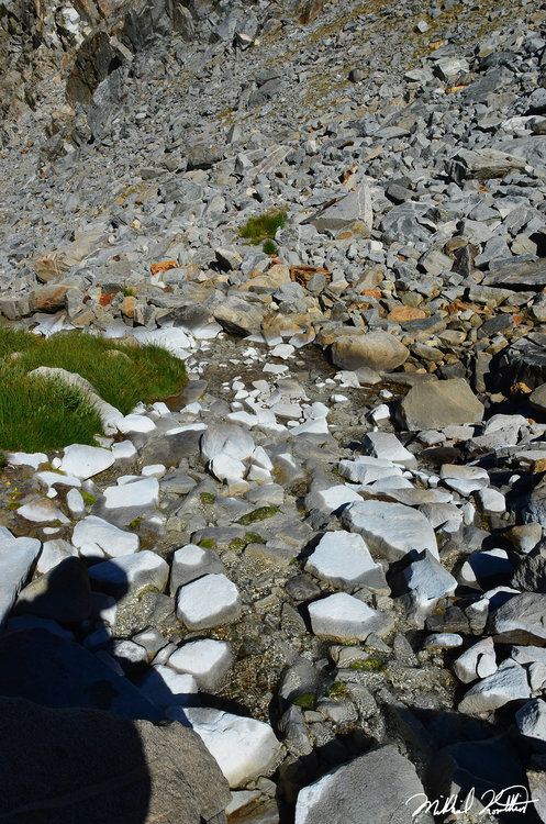 The white stained rocks along the stream that's fed by the spring up high. The water was pure delight.
