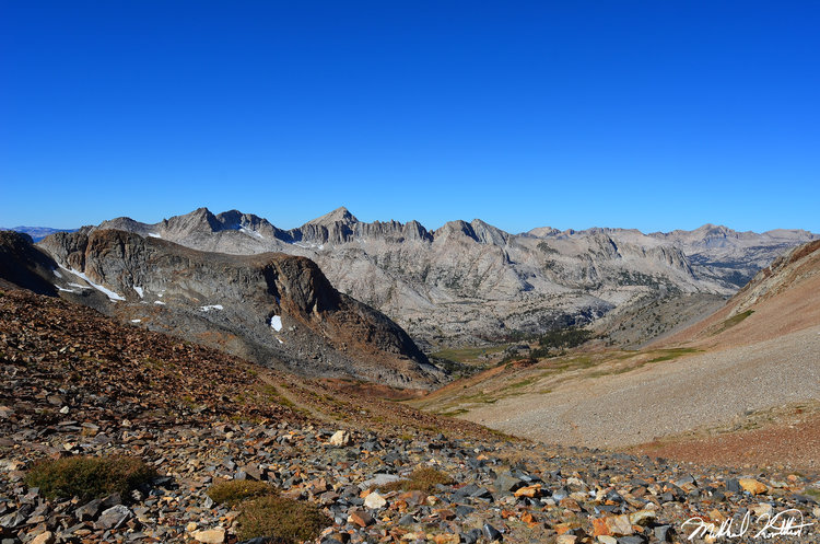 Looking West from the top of McGee Pass you enter into an enchanting valley and a stark contrast from the red metamorphic rocks to the muted gray granite.