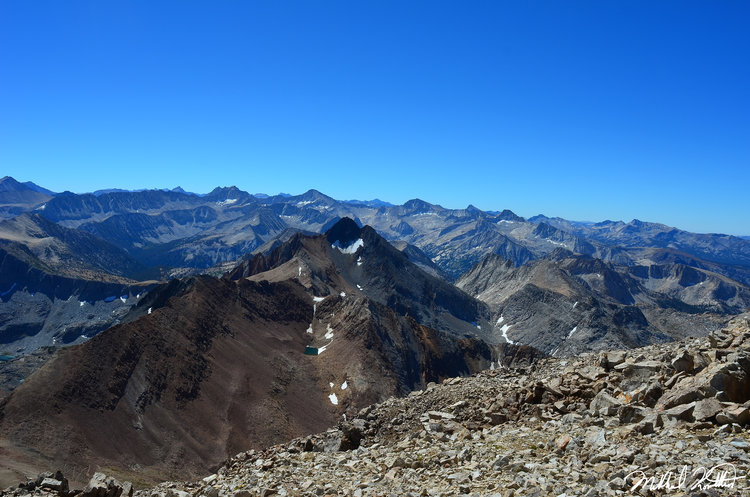 Looking South and West you have an unobstructed view of the some of the finest peaks in the entire Sierra. Everything from Mt. Gabb to Mt. Goddard under some of the bluest skies I had ever seen!