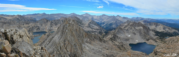 Looking South from Peak 12,238 you get an incredibly jagged ridgeline right in your face. The majestic Mono Divide rises prominently in the background. To the left is Grinnell Lake in the Laurel Creek drainage and to the right is Rosy Finch Lake.
