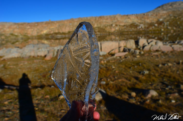 The crazy 1/2 inch thick ice in the bucket the morning of our climb of Mt. Humphrey's.