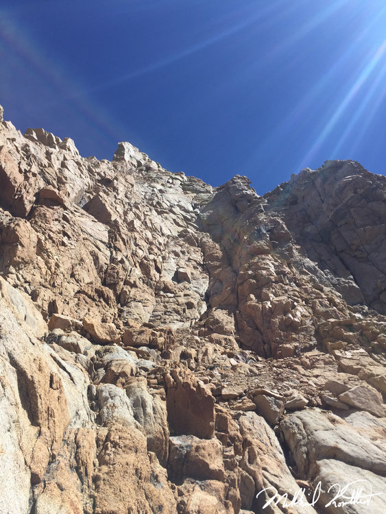 We climbed down the Class 3/4 wall when it was finally sunny and warmer. It was a fun climb down and one I definitely would do again.
