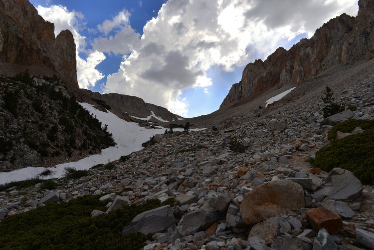 Out of the desert and into the land of rock! The pass is still out of view.
