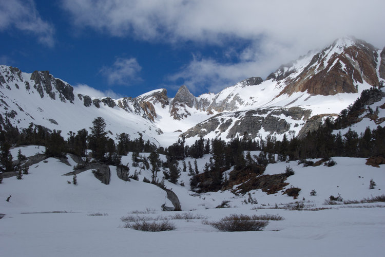 A fleeting patch of blue sky over Hopkins Pass and Red and White Mountain.