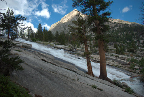 Dusy Creek rushes by as the Bishop Pass trail climbs out of Le Conte Canyon