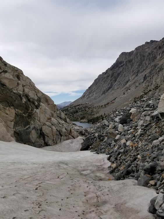 First glimpse of Dragon Lake, and the final stretch of boulder hopping.