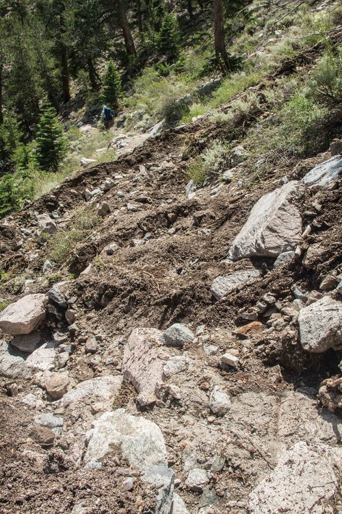 the worse damage is on the north side.  This washout crossed 7 switchbacks