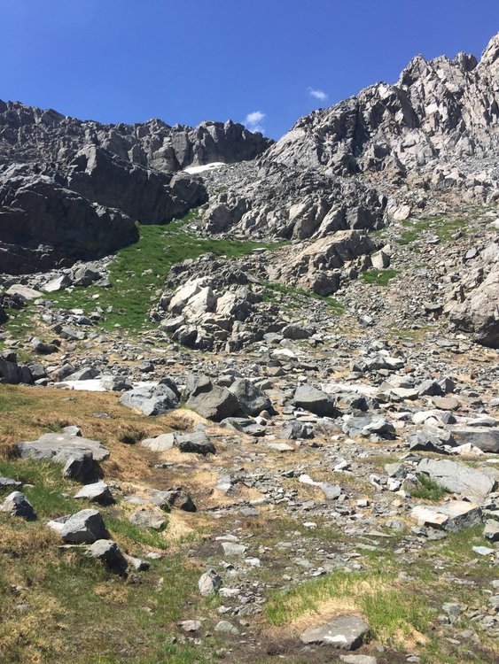 View from southeast of Beck Lakes Pass -- I came down from notch along wall on the right, then scrambled down to grassy slope on the left