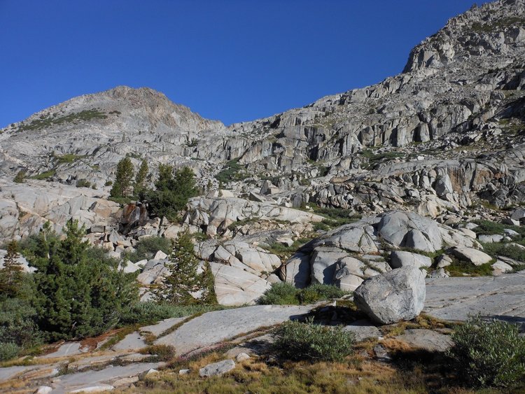 Cliffs leading to Cirque Pass -- I came down the steep meadow on the left/west