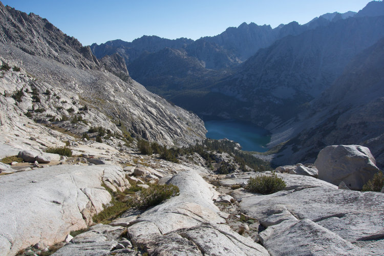 Following advice from RoguePhotonic, I traversed from along the 11,500' line northeast towards the grassy terrace pictured on the left.