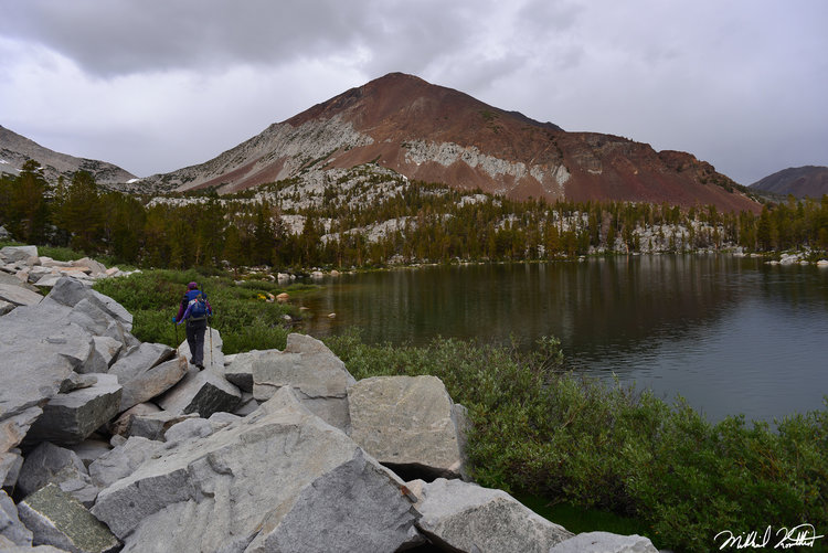 By this time the trail had disappeared and we travelled cross country around this lake.  Bloody Mountain stands proudly above.. Need I explain why it’s named as such.
