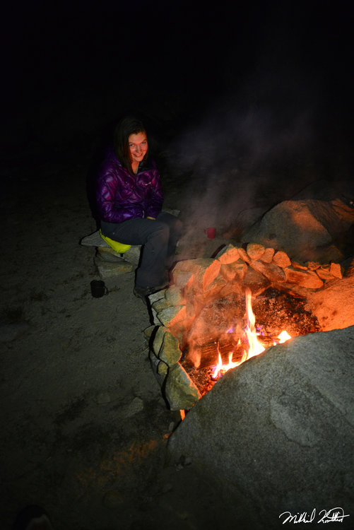 Happy Janine by the campfire where there were no mosquitoes!