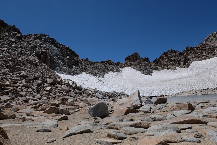 Lamarck Col, early August 2018. The Pass is slightly left of center, roughly above where the left-most snow track terminates.