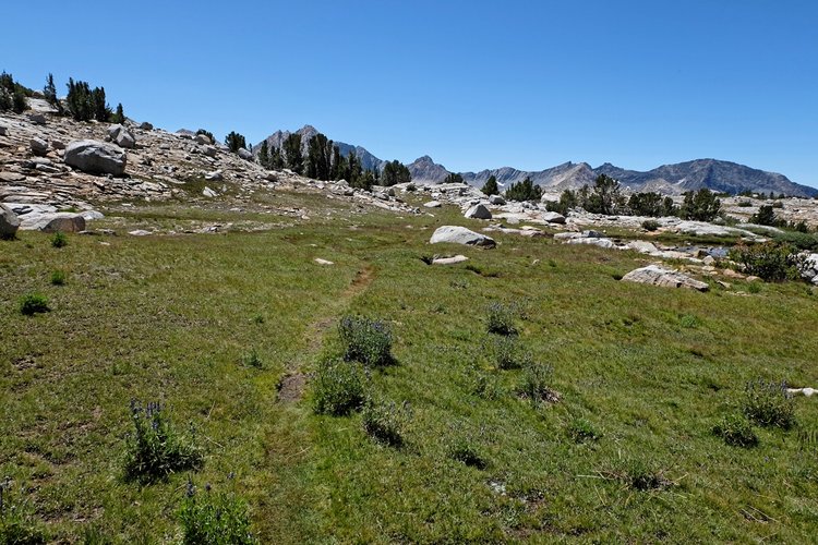 Open country below lakes.