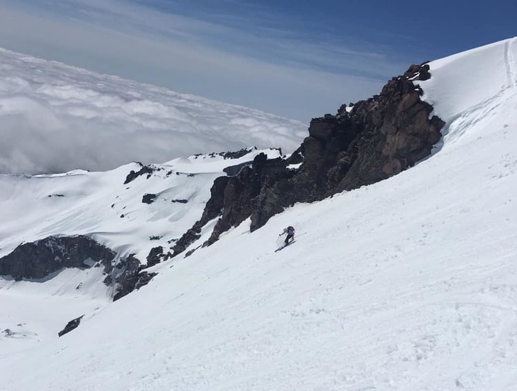 The obligatory action shot of me skiing the &quot;chute&quot; (it's really more of a bowl). The weather was perfect after punching through the clouds.