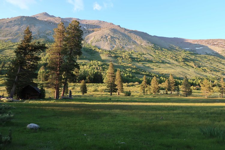 Sunset from my tent site, cabin in the shadow